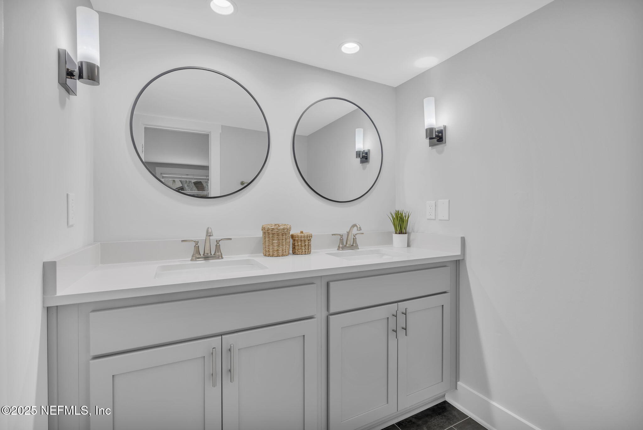 431 19th Street North Jacksonville Beach, FL 32250 - Photo 16 of 53 a bathroom with a double vanity sink and a mirror