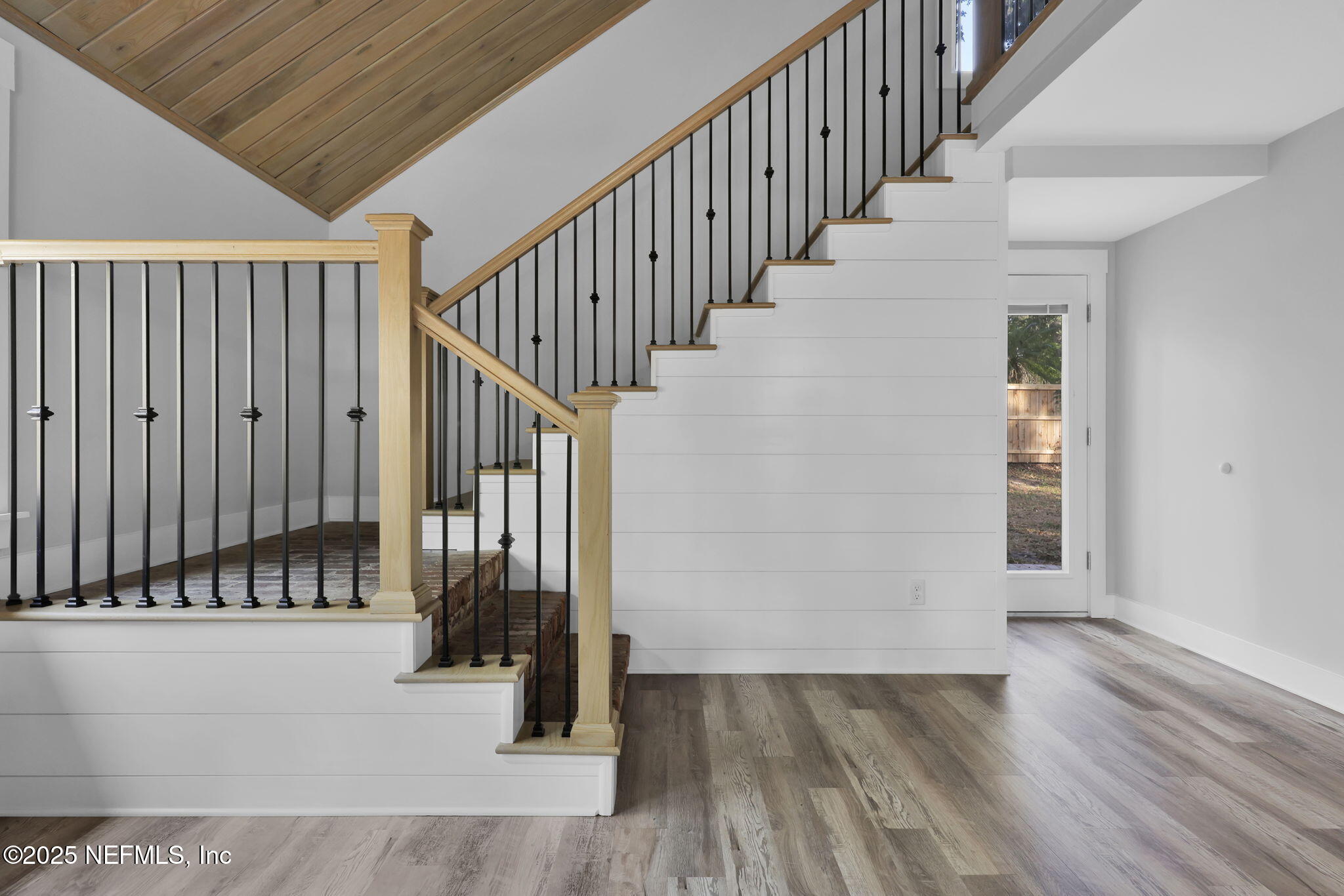 431 19th Street North Jacksonville Beach, FL 32250 - Photo 22 of 53 a view of hallway with stairs and wooden floor