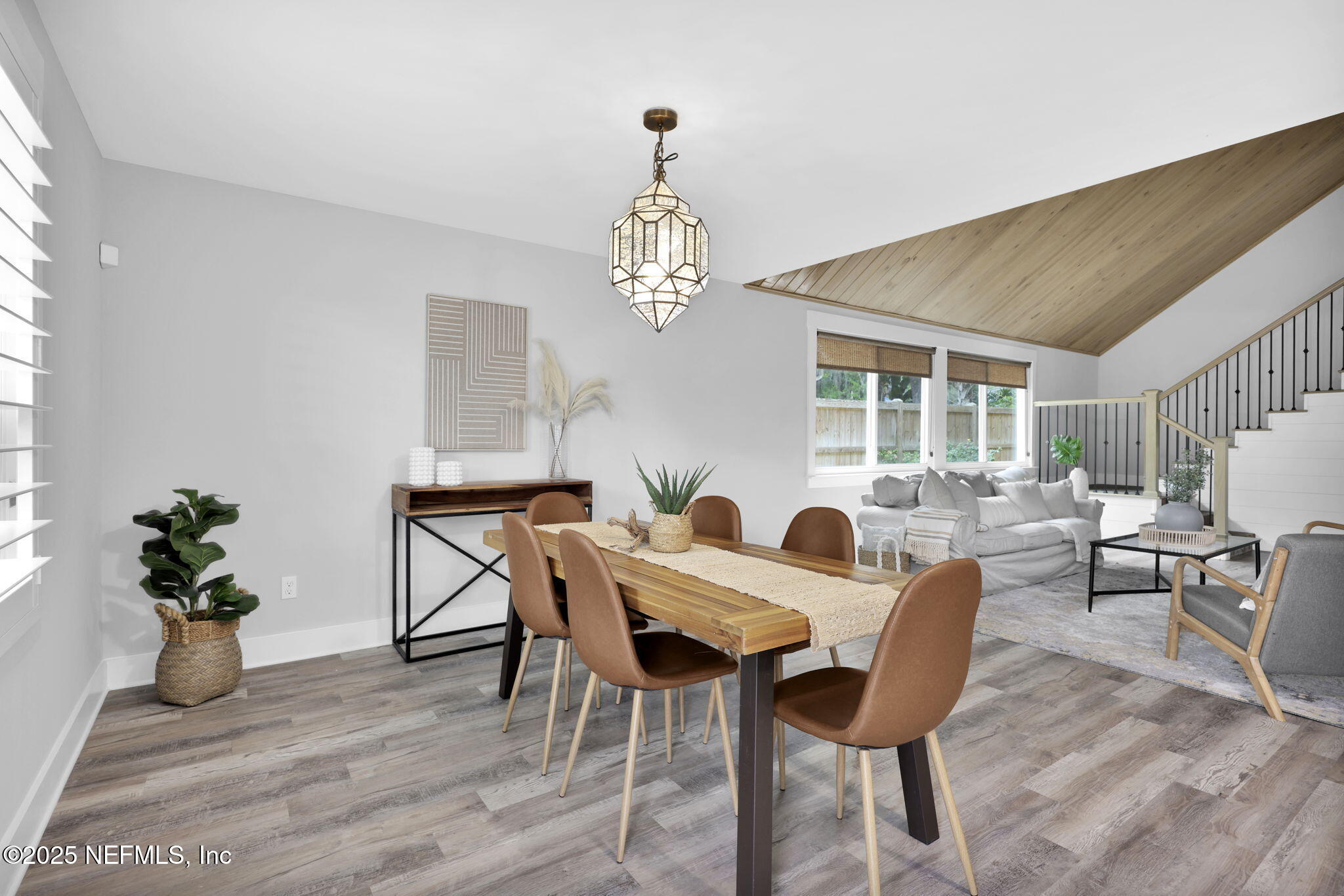 431 19th Street North Jacksonville Beach, FL 32250 - Photo 6 of 53 a view of a dining room with furniture window and wooden floor