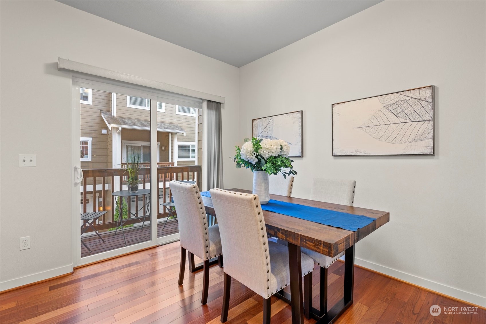 2026 112th Street Southwest Everett, WA 98204 - Photo 11 of 33 a dining room with furniture and wooden floor