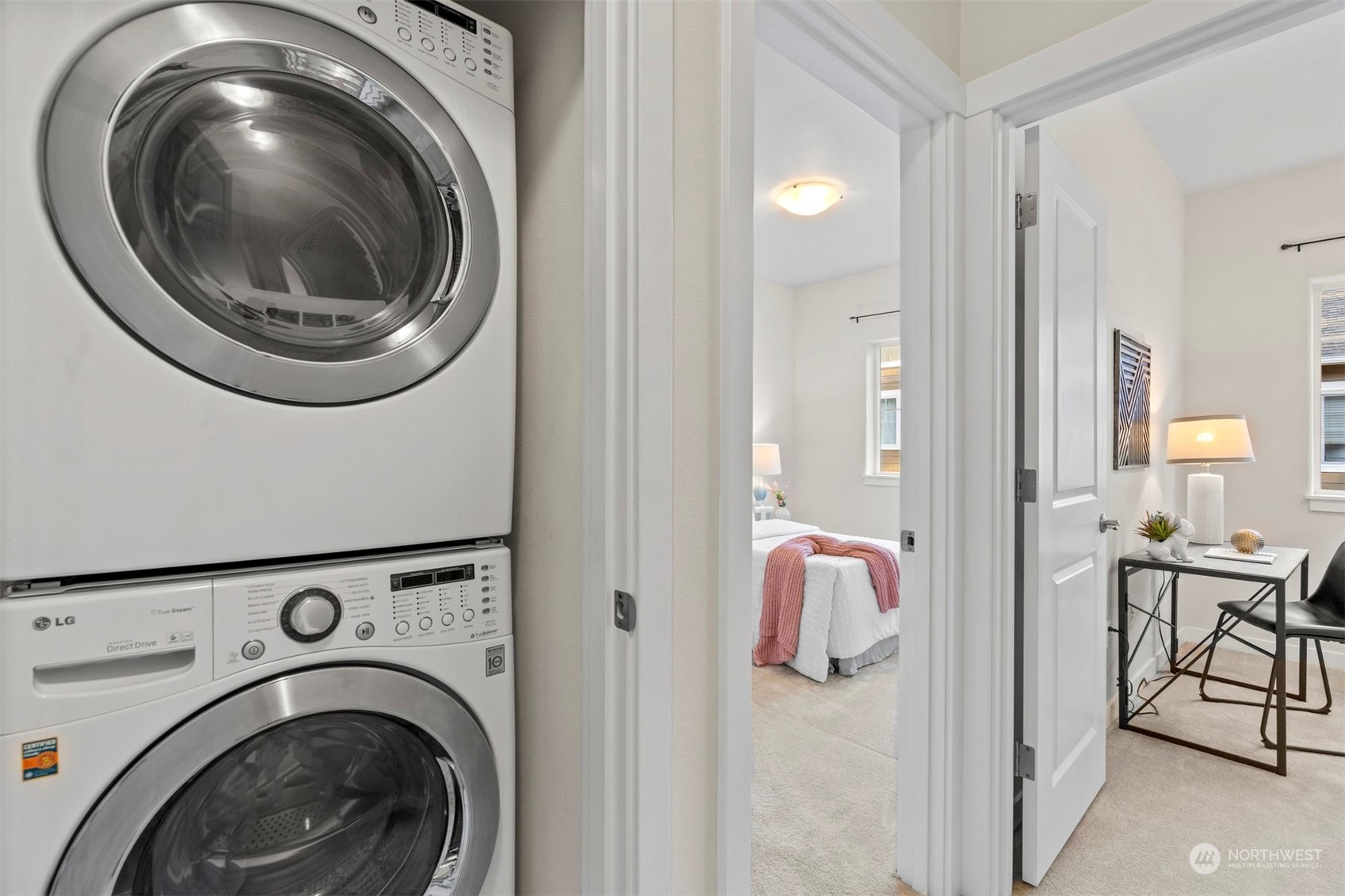 2026 112th Street Southwest Everett, WA 98204 - Photo 22 of 33 a view of a hallway with washer and dryer