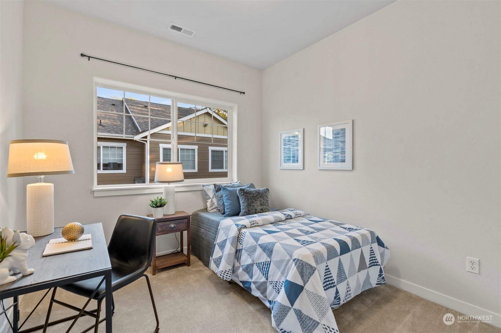 2026 112th Street Southwest Everett, WA 98204 - Photo 23 of 33 a bedroom with a bed and a window