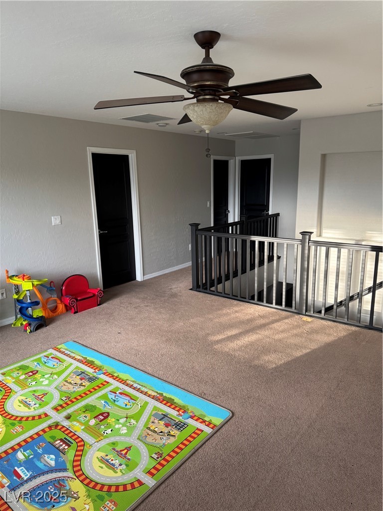 5522 Porcupine Rim Street Las Vegas, NV 89130 - Photo 12 of 28 Recreation room with carpet flooring and ceiling fan