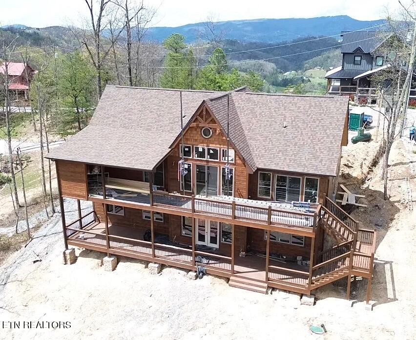 1841 Pinestand Rdg Way Sevierville, TN 37862 - Photo 23 of 23 an aerial view of a house with a yard balcony and furniture