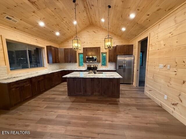 1841 Pinestand Rdg Way Sevierville, TN 37862 - Photo 4 of 23 a large kitchen with kitchen island a sink stainless steel appliances and cabinets