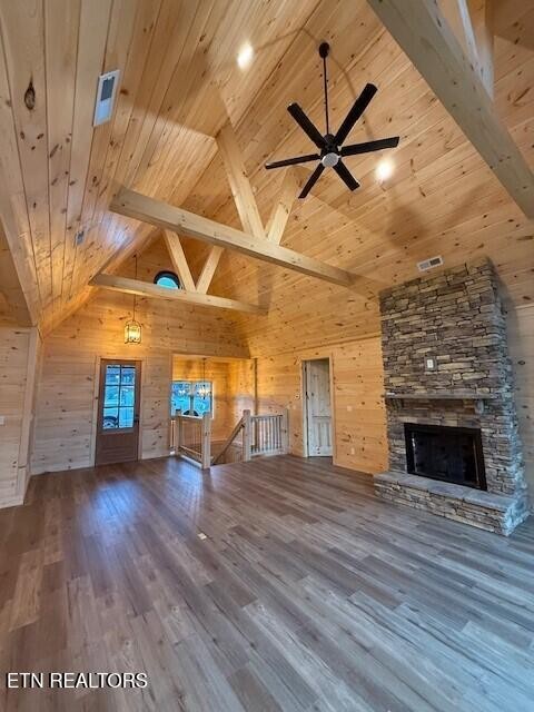 1841 Pinestand Rdg Way Sevierville, TN 37862 - Photo 6 of 23 a view of an empty room with wooden floor fireplace and windows