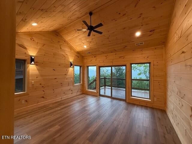 1841 Pinestand Rdg Way Sevierville, TN 37862 - Photo 7 of 23 an empty room with wooden floor and windows