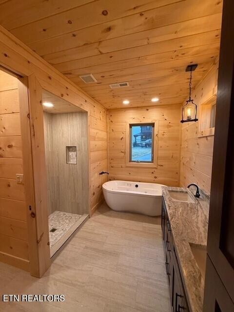 1841 Pinestand Rdg Way Sevierville, TN 37862 - Photo 8 of 23 a bathroom with a tub and shower