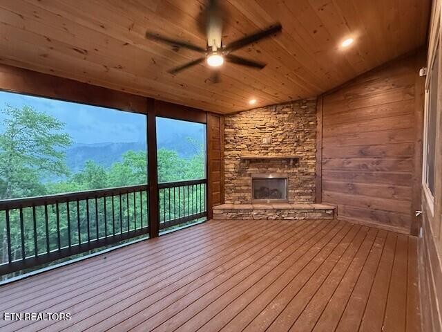 1841 Pinestand Rdg Way Sevierville, TN 37862 - Photo 9 of 23 a view of an empty room with wooden floor and a floor to ceiling window
