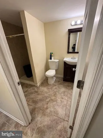 a bathroom with a sink and toilet