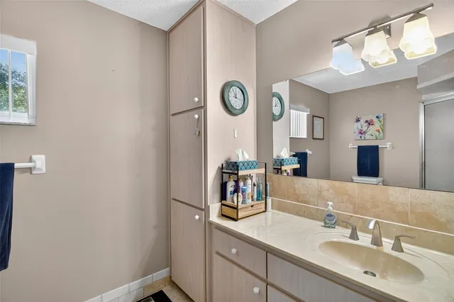 a bathroom with a shower and a toilet