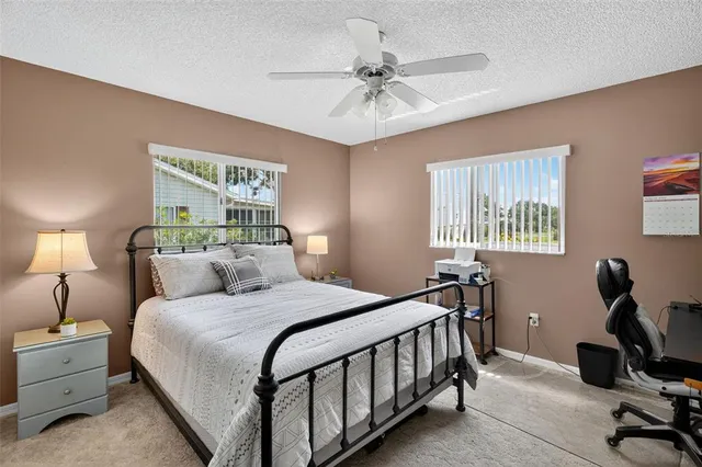 a bathroom with a sink toilet and a mirror