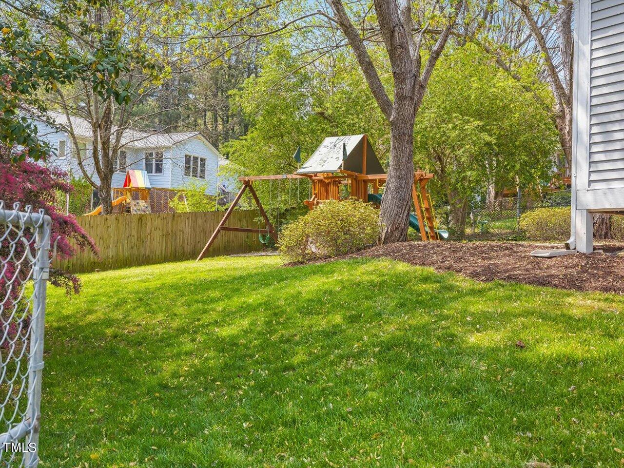 7001 Three Bridges Circle Raleigh, NC 27613 - Photo 23 of 25 a view of backyard with green space