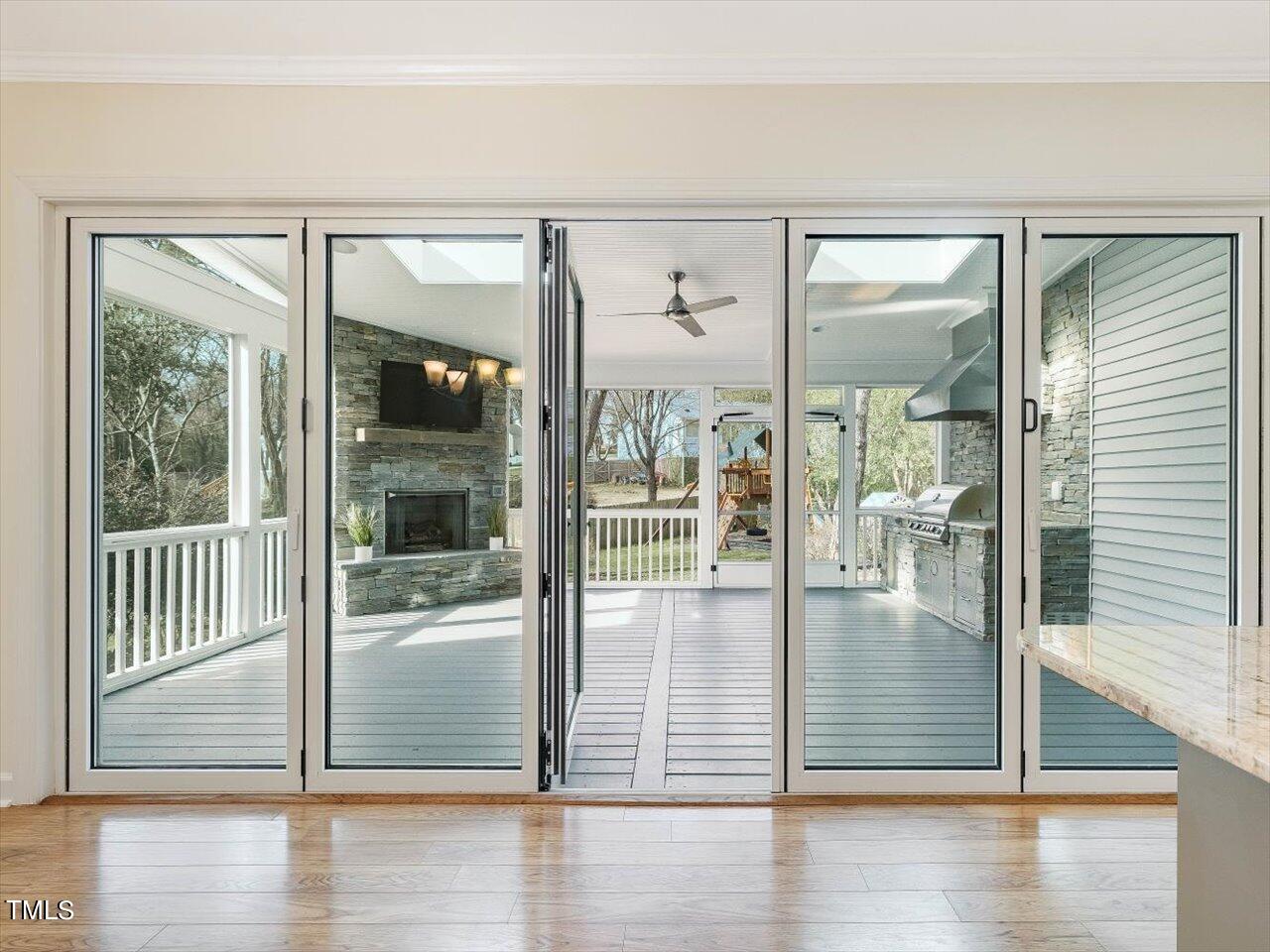 7001 Three Bridges Circle Raleigh, NC 27613 - Photo 6 of 25 a view of a glass door with a glass door