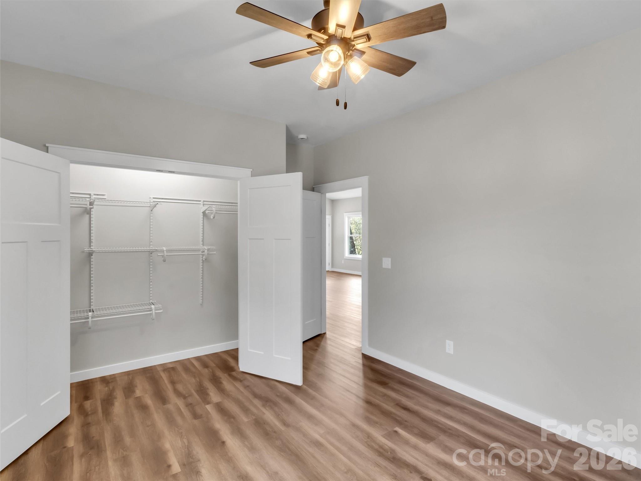 171 Peyton Elaine Road Clyde, NC 28721 - Photo 16 of 25 wooden floor in an empty room