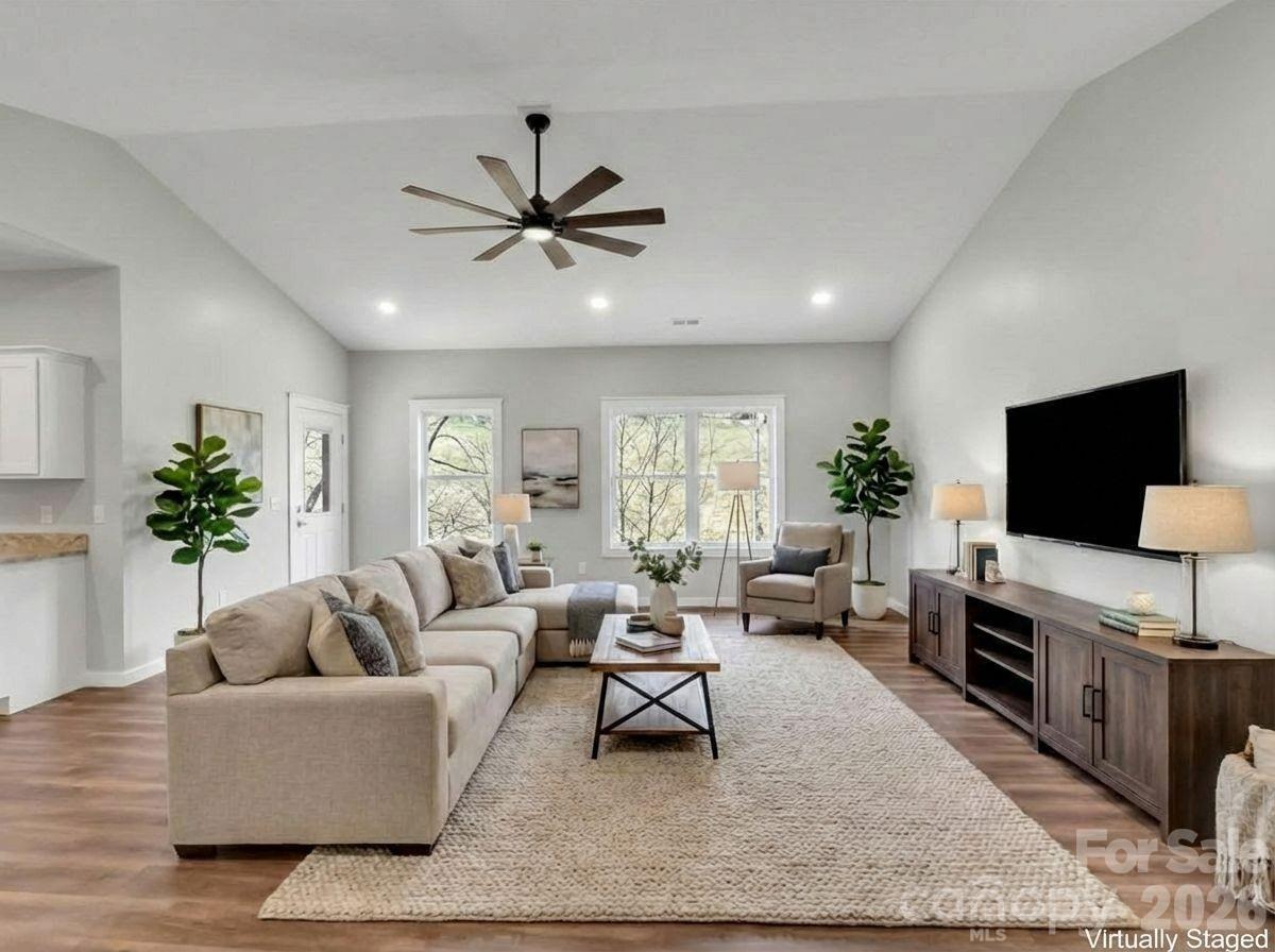171 Peyton Elaine Road Clyde, NC 28721 - Photo 5 of 25 a living room with furniture and a flat screen tv