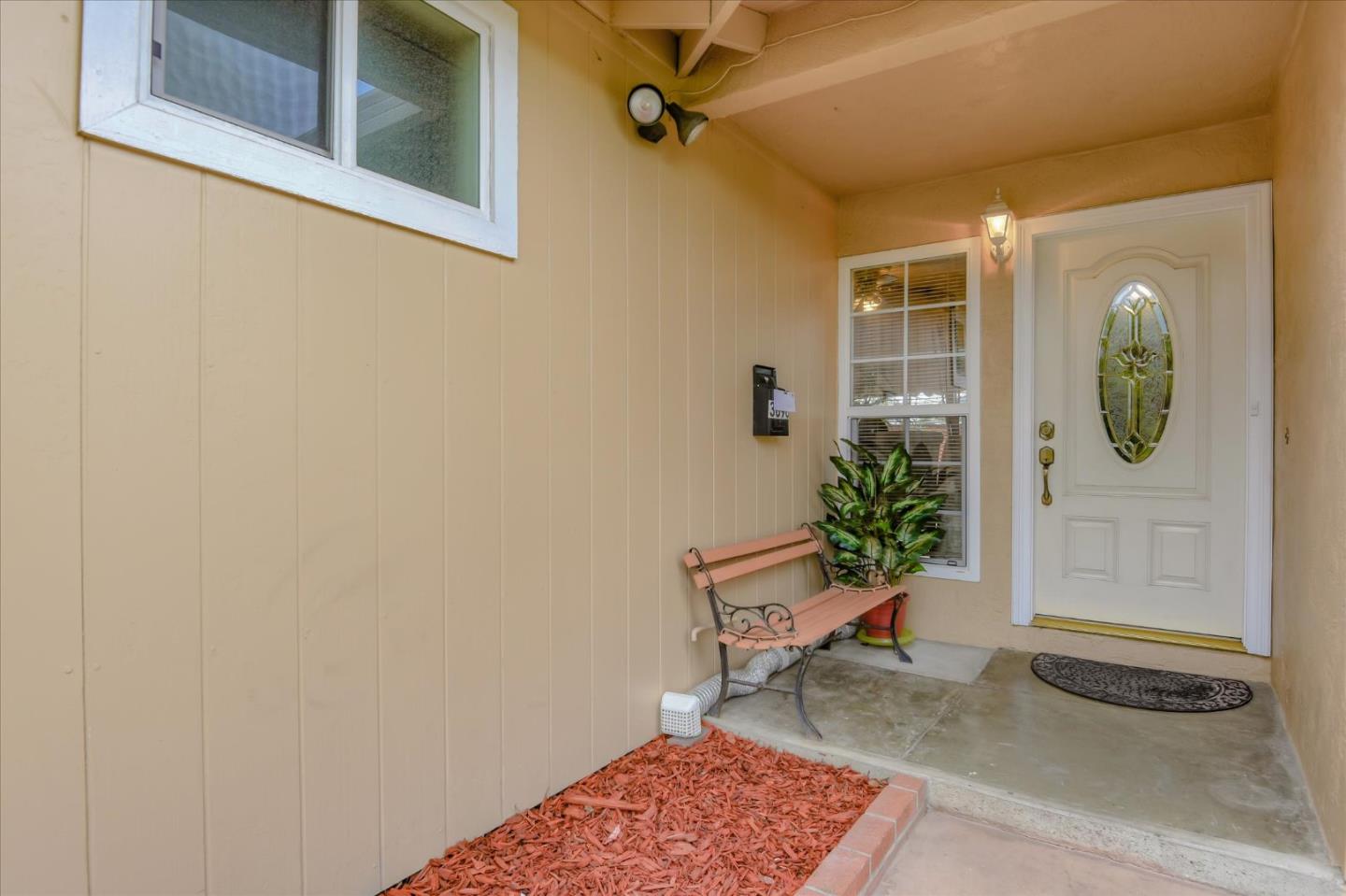 3696 Norfolk Road Fremont, CA 94538 - Photo 3 of 34 a living room with furniture and a potted plant