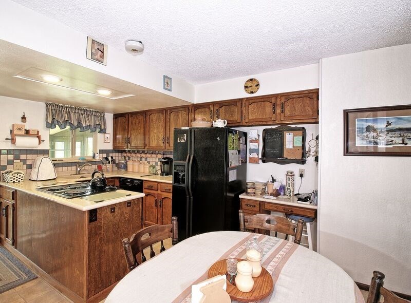 2065 H H 3/4 Road Fruita, CO 81521 - Photo 10 of 42 a kitchen with stainless steel appliances a refrigerator stove microwave and sink