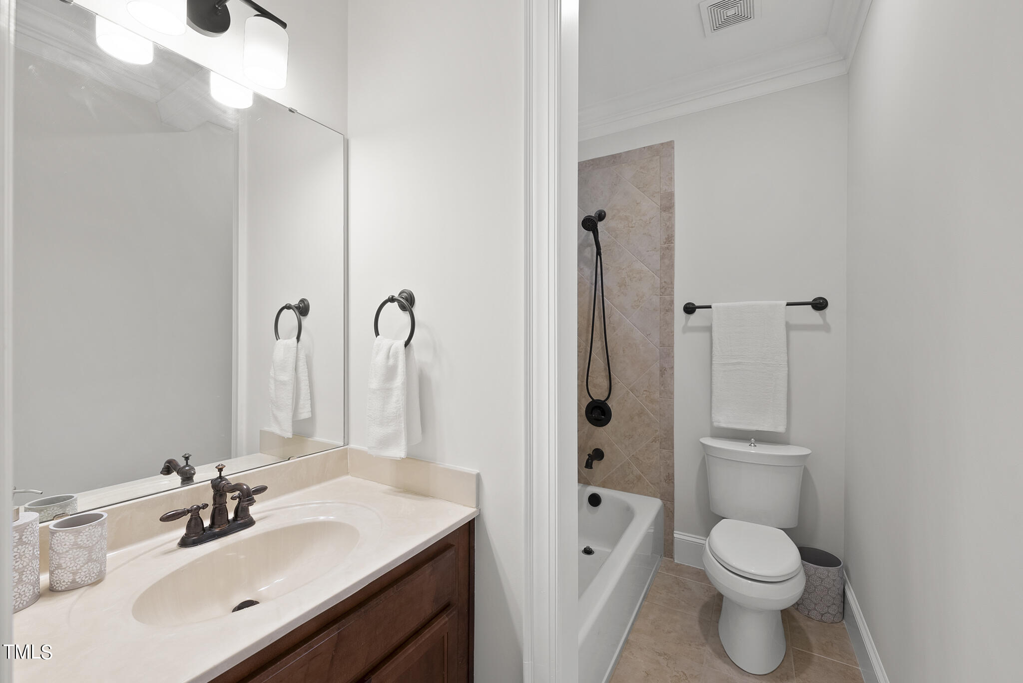 8412 Norman Estates Way Raleigh, NC 27613 - Photo 31 of 77 1st floor guest bathroom
