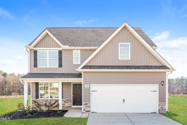 a view of house and yard