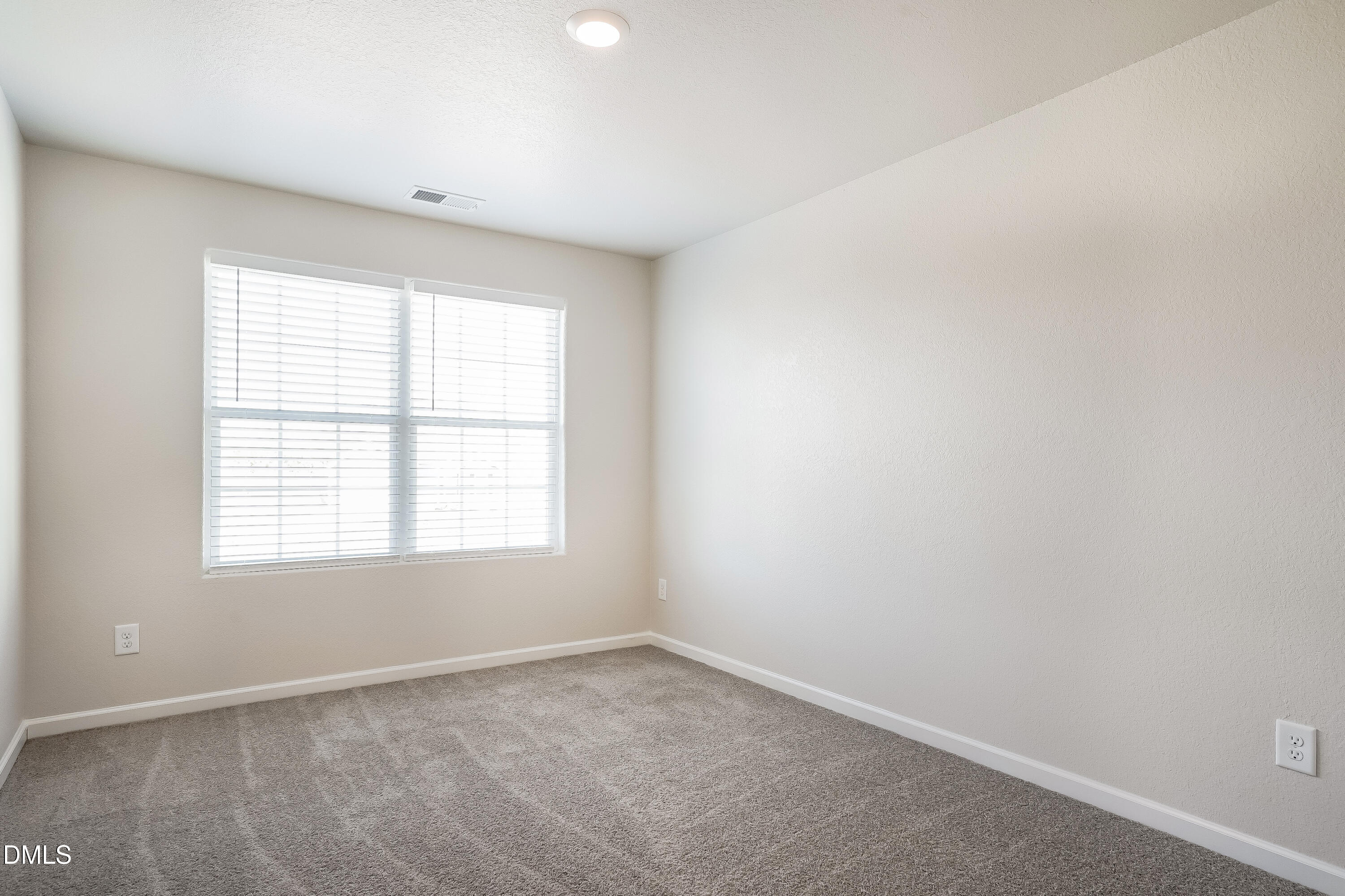 124 Lahinch Drive Fuquay-Varina, NC 27526 - Photo 11 of 17 an empty room with a window