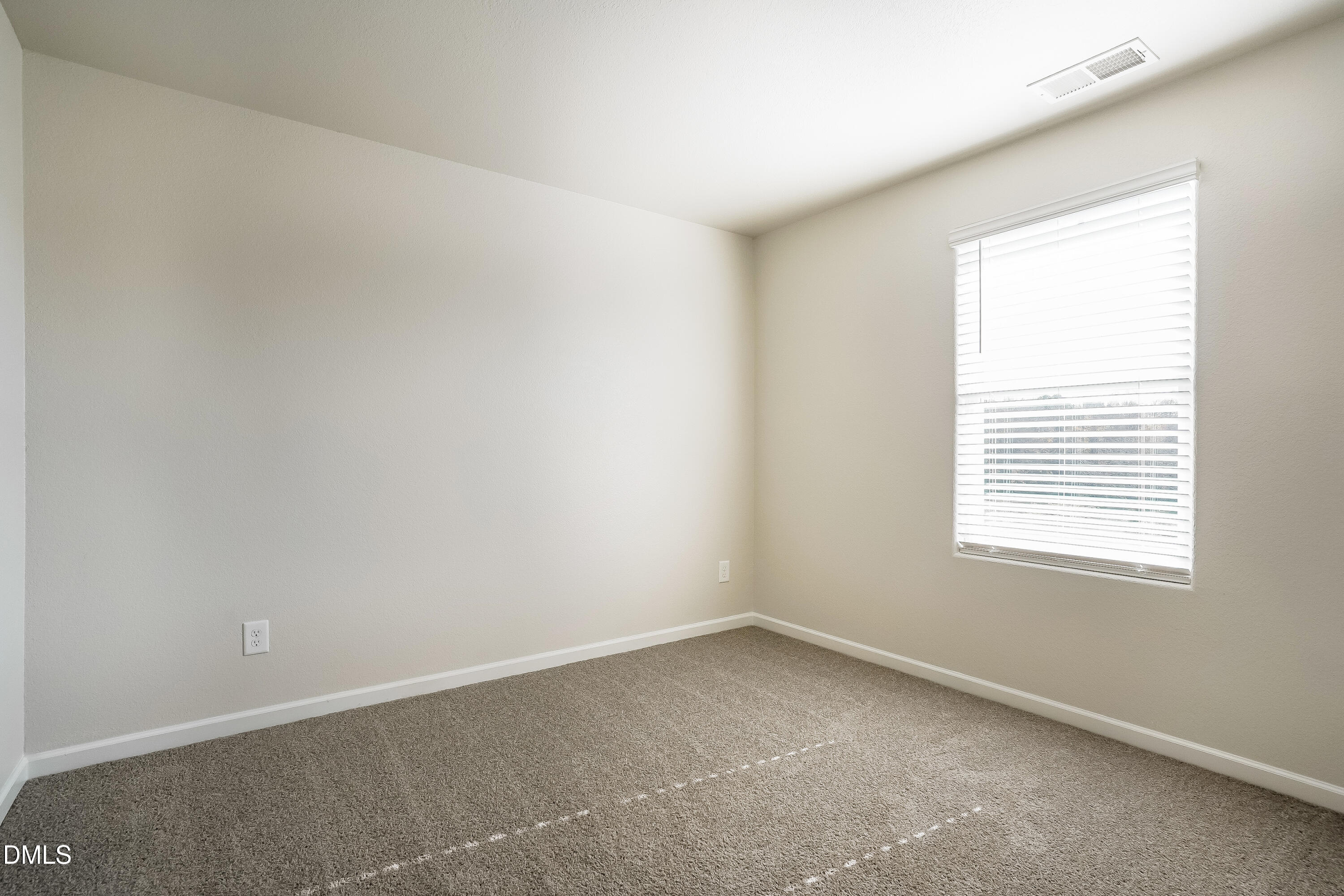 124 Lahinch Drive Fuquay-Varina, NC 27526 - Photo 12 of 17 an empty room with a window
