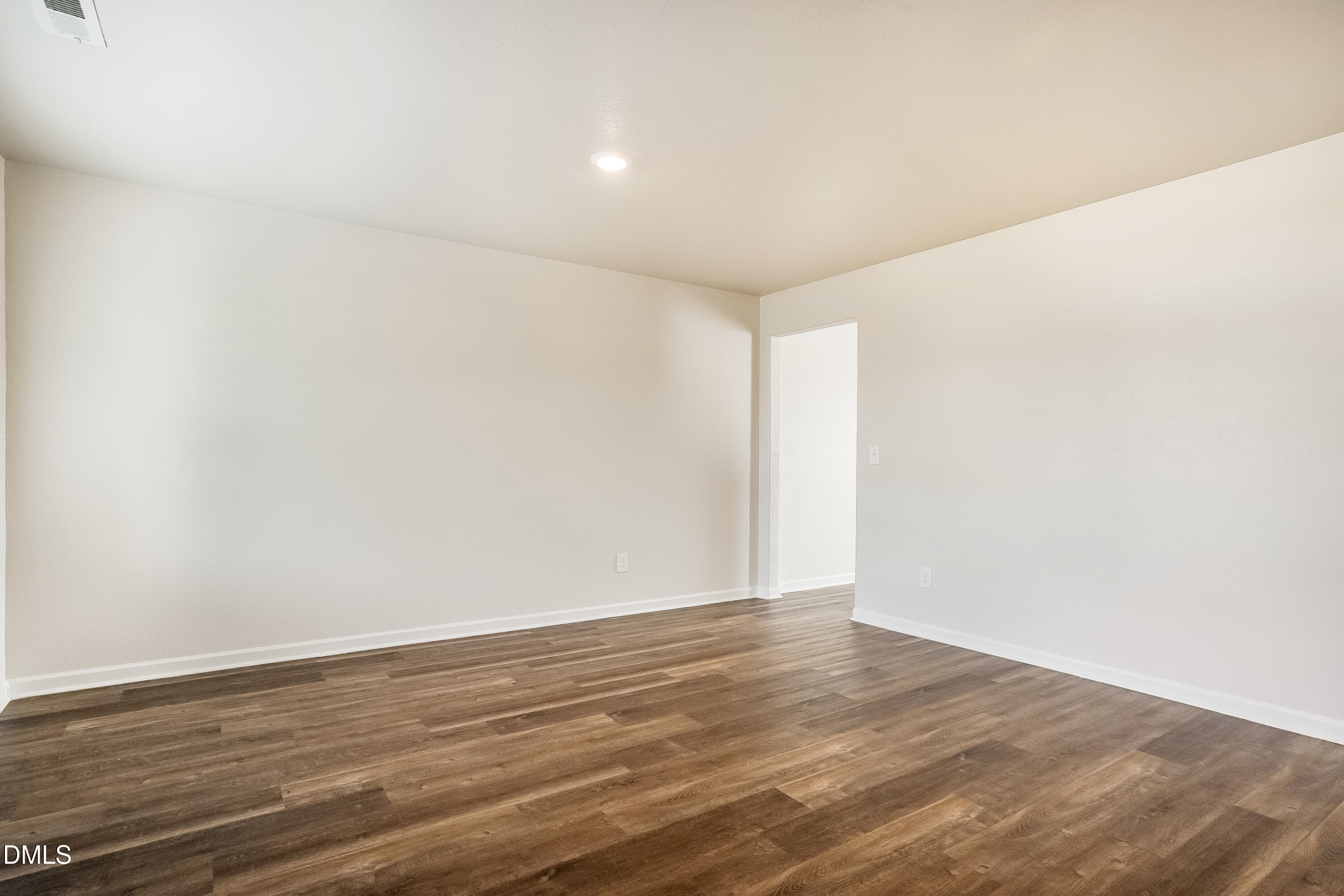 124 Lahinch Drive Fuquay-Varina, NC 27526 - Photo 5 of 17 a view of an empty room