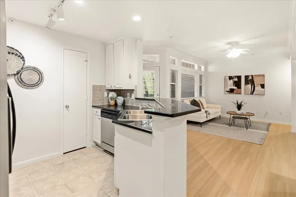 a living room with furniture and a window