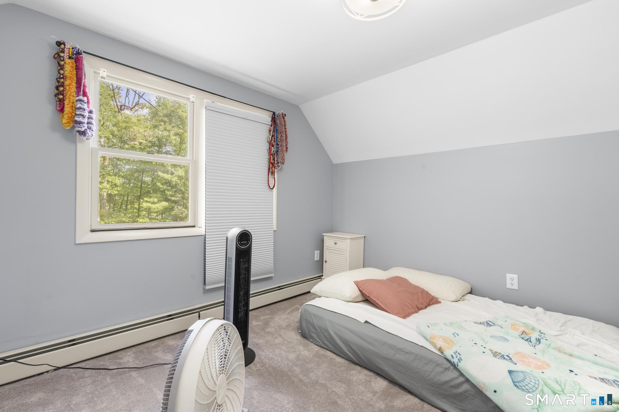 13 Christy Hill Road Ledyard, CT 06335 - Photo 27 of 38 a bedroom with a bed and a window