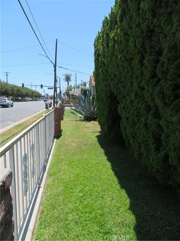 a bathroom with a glass door shower and sink