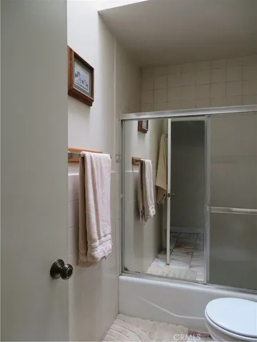 a bathroom with a double vanity sink and mirror
