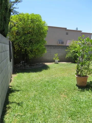 a view of staircase with racks on the wall