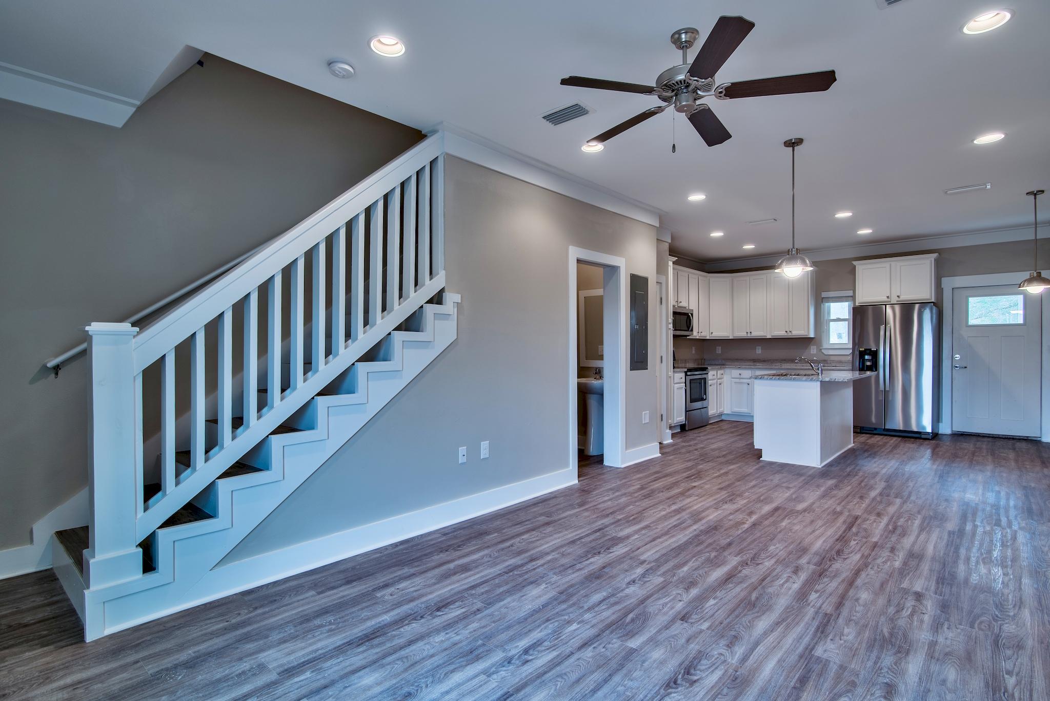 50 South Sand Palm Road, Unit LOT 41 Freeport, FL 32439 - Photo 1 of 20 a view of kitchen with stainless steel appliances refrigerator oven stove microwave and cabinets