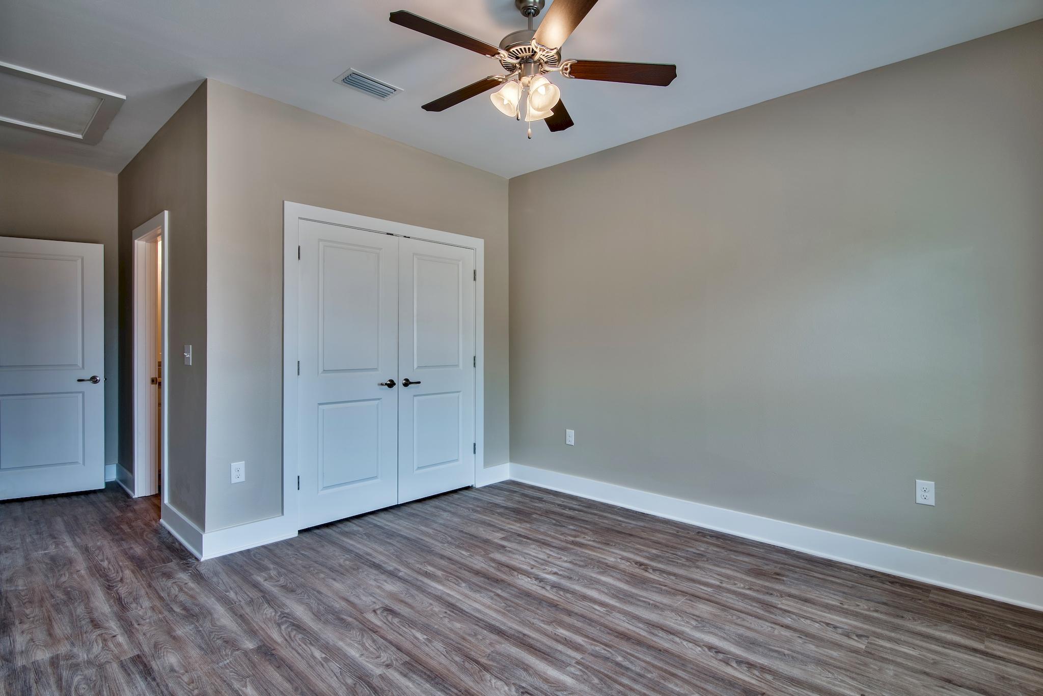 50 South Sand Palm Road, Unit LOT 41 Freeport, FL 32439 - Photo 15 of 20 wooden floor in an empty room with a window