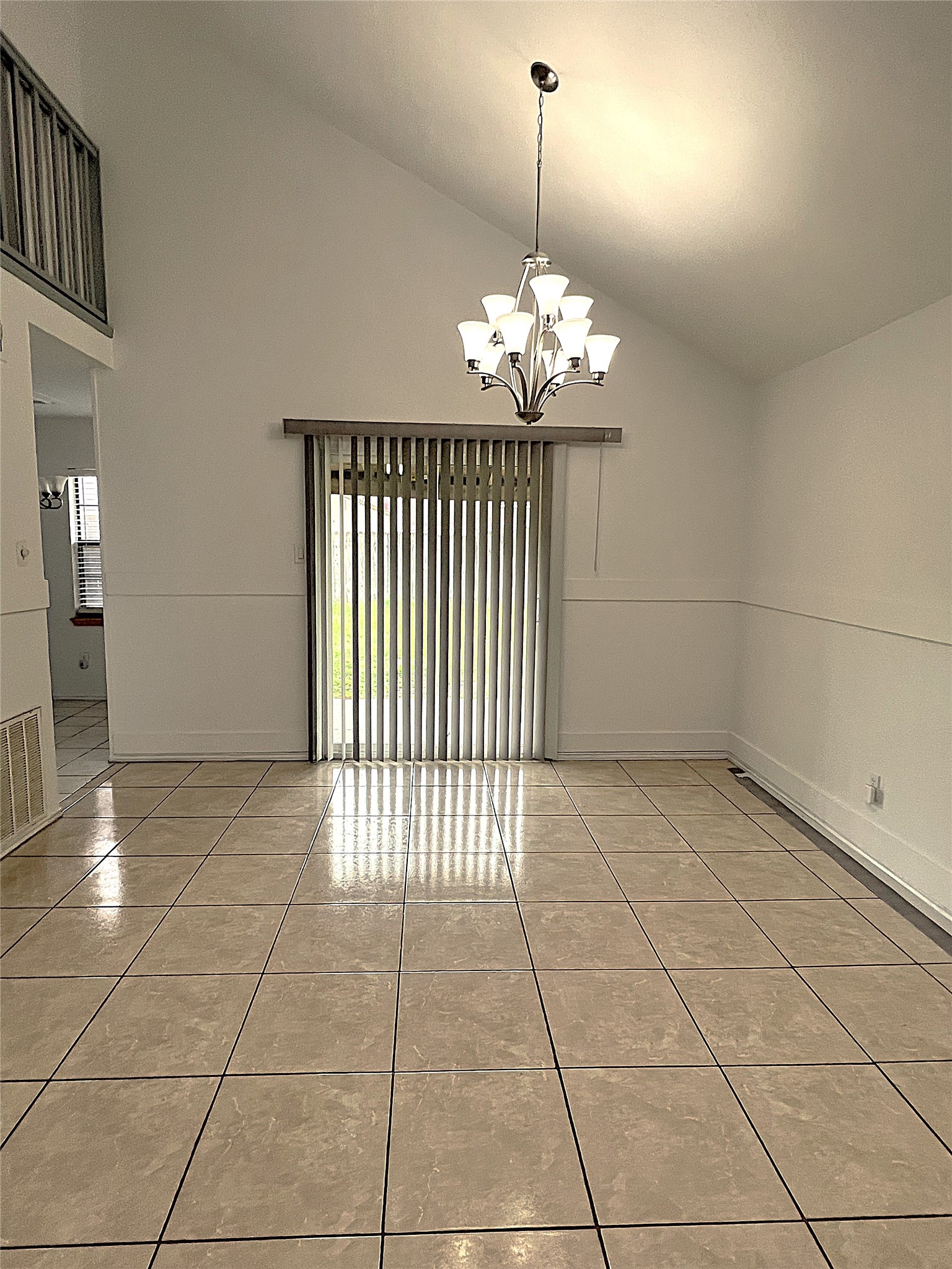 19906 Rising Star Drive Humble, TX 77338 - Photo 11 of 32 a view of a livingroom with a chandelier