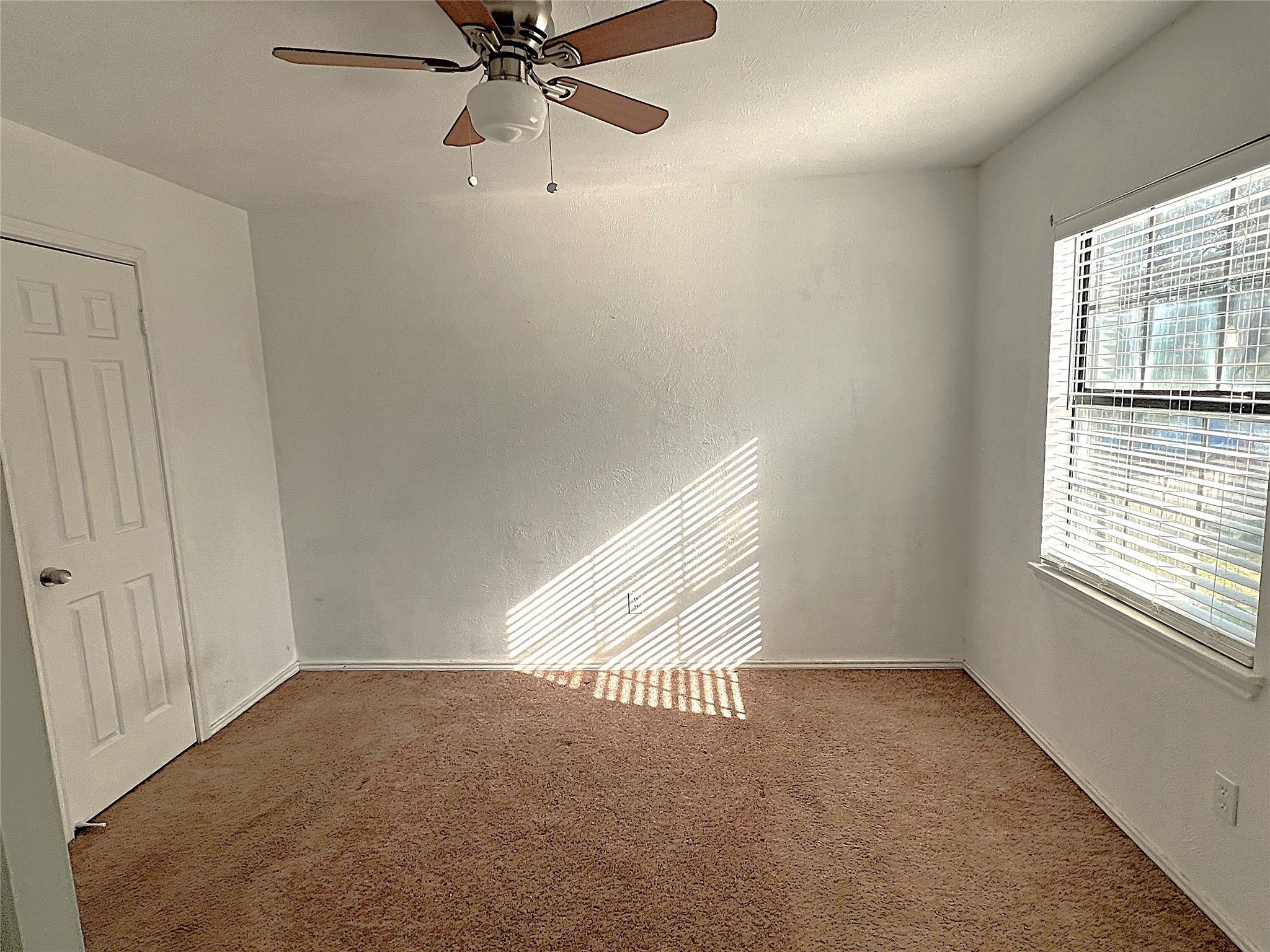 19906 Rising Star Drive Humble, TX 77338 - Photo 16 of 32 an empty room with a window