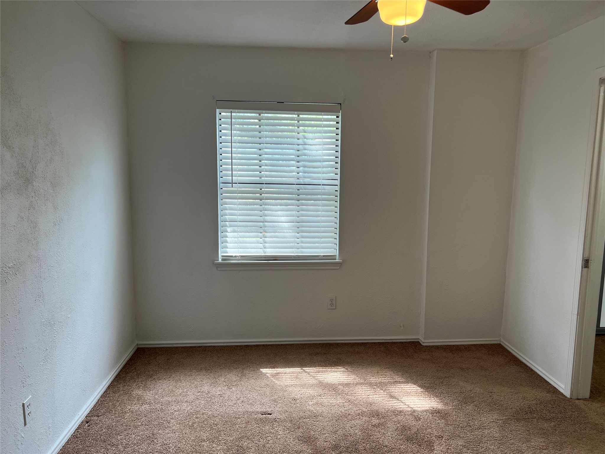 19906 Rising Star Drive Humble, TX 77338 - Photo 17 of 32 an empty room with a window