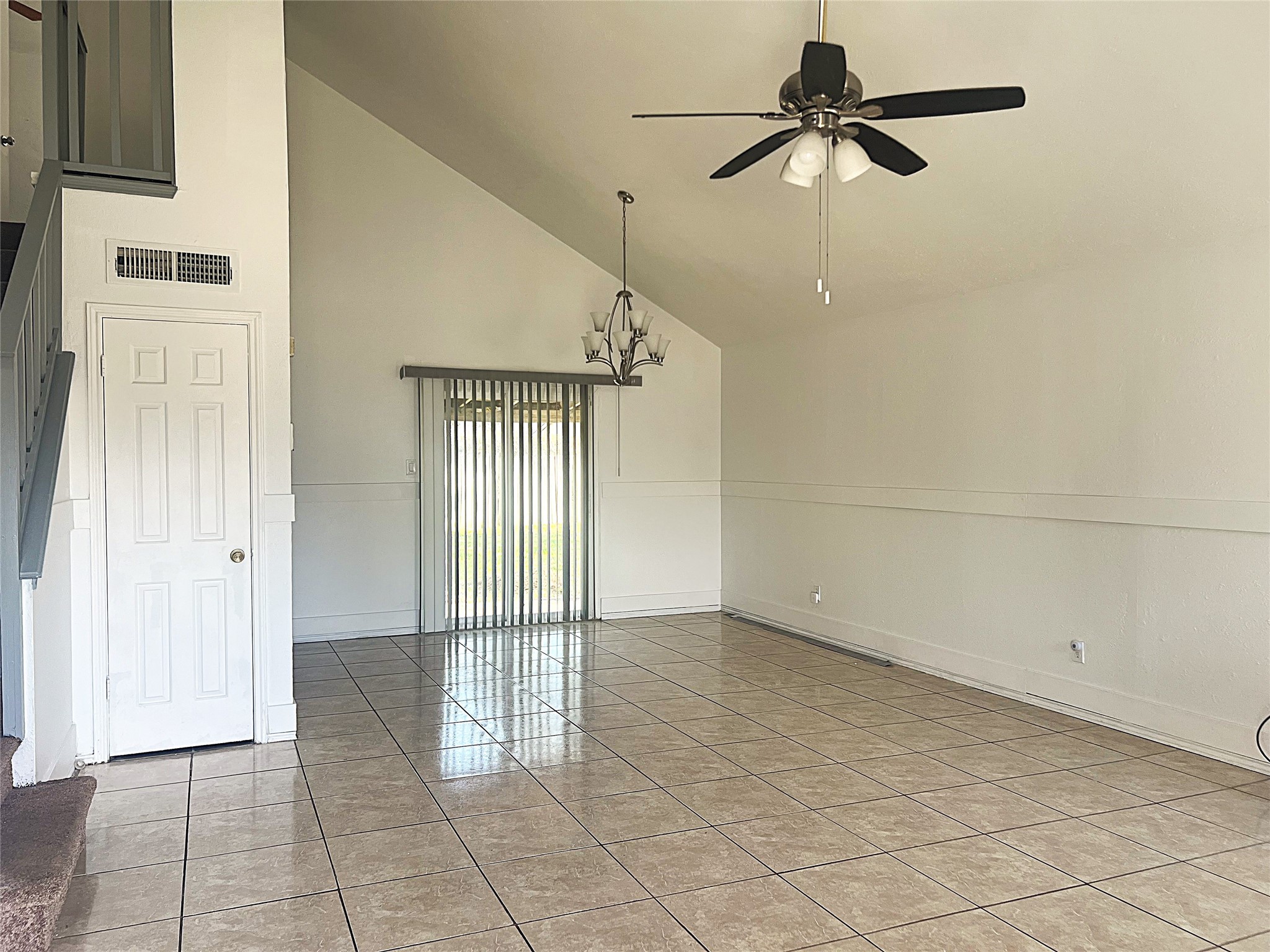 19906 Rising Star Drive Humble, TX 77338 - Photo 2 of 32 an empty room with fan and windows