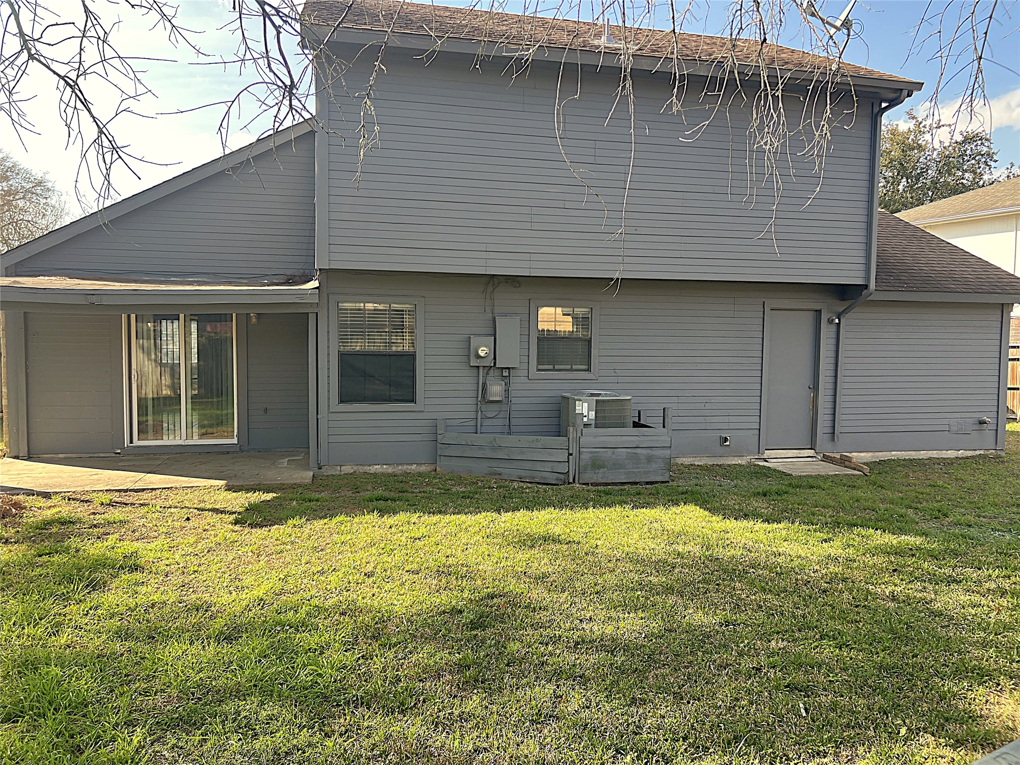 19906 Rising Star Drive Humble, TX 77338 - Photo 31 of 32 a front view of a house with a yard