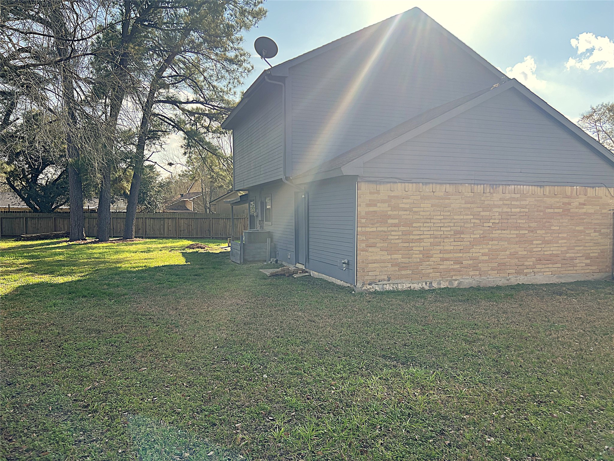 19906 Rising Star Drive Humble, TX 77338 - Photo 32 of 32 a view of a swimming pool with an outdoor space and seating area