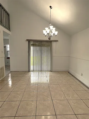 a view of a livingroom with a chandelier