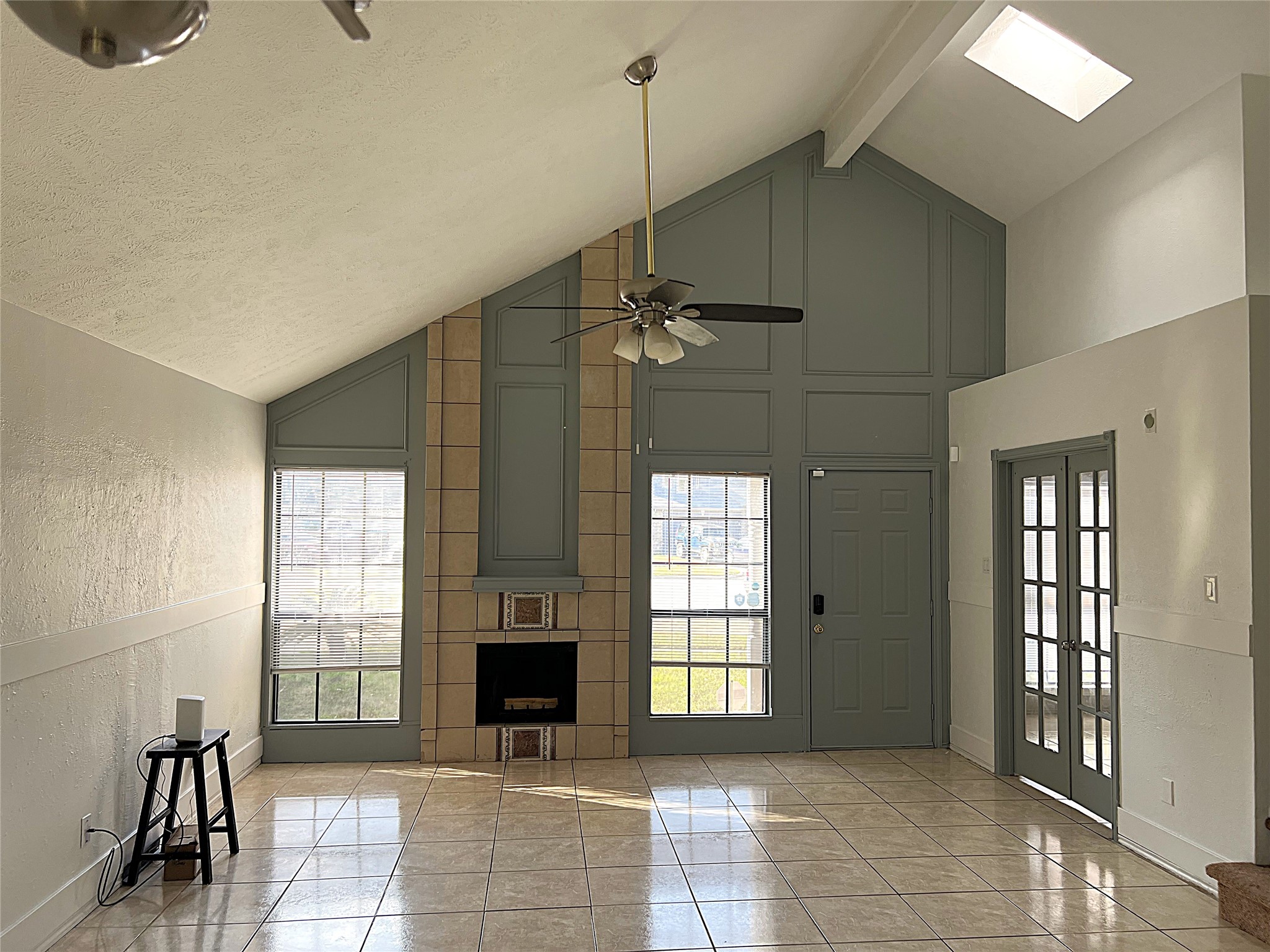 19906 Rising Star Drive Humble, TX 77338 - Photo 9 of 32 a view of a hallway with windows and chandelier