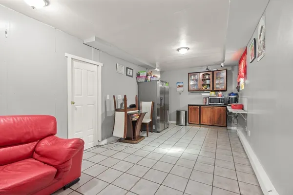 a living room with furniture and a couch