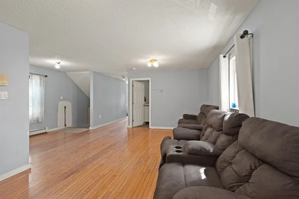 a living room with furniture and a couch