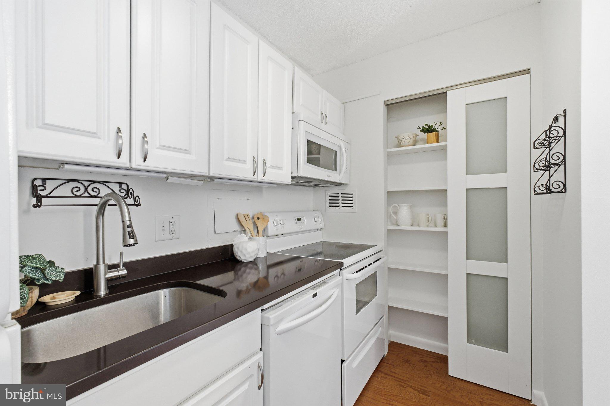 1718 P Street Northwest, Unit 809 Washington, DC 20036 - Photo 9 of 24 Charming kitchen with modern finishes.