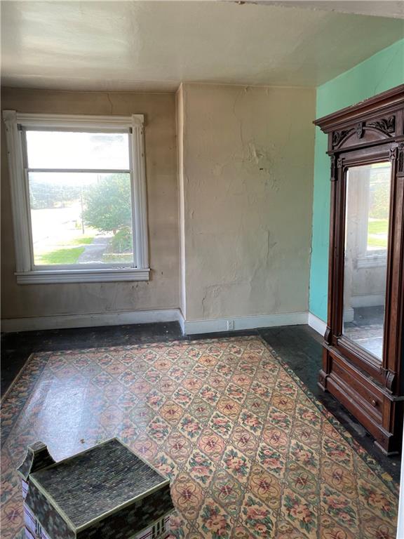695 Main Street Addison, PA 15411 - Photo 7 of 11 a view of room with window and wooden floor