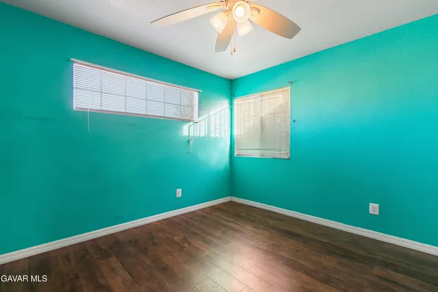 a view of a room that has a large window