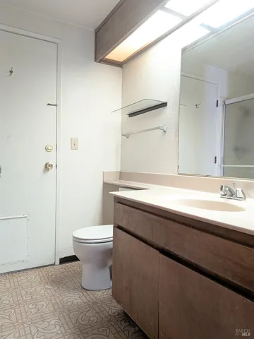 a bathroom with a sink and toilet