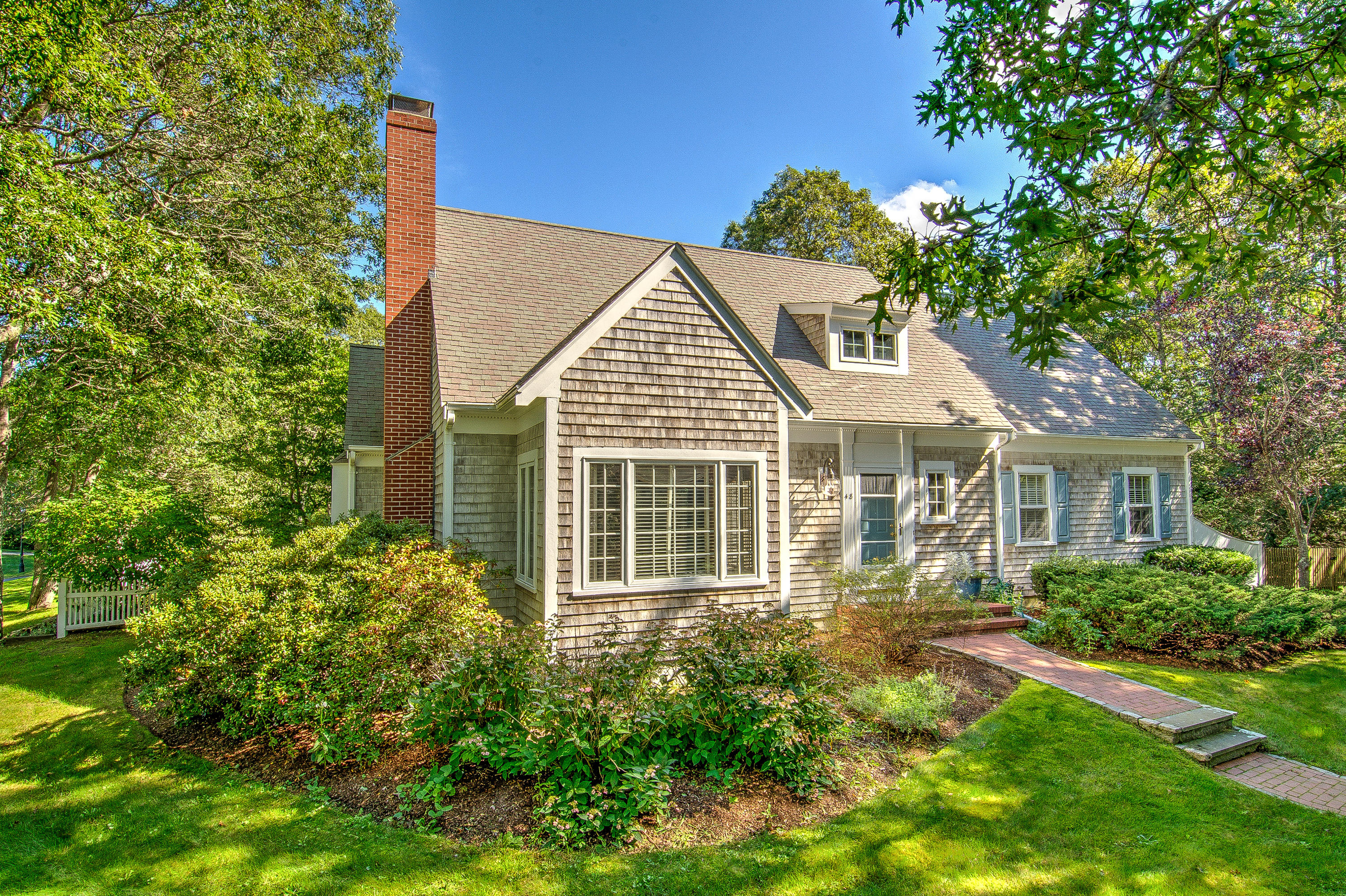 48 Crystal Ridge Road Marstons Mills, MA 02648 - Photo 1 of 26 a view of outdoor space yard and front view of a house