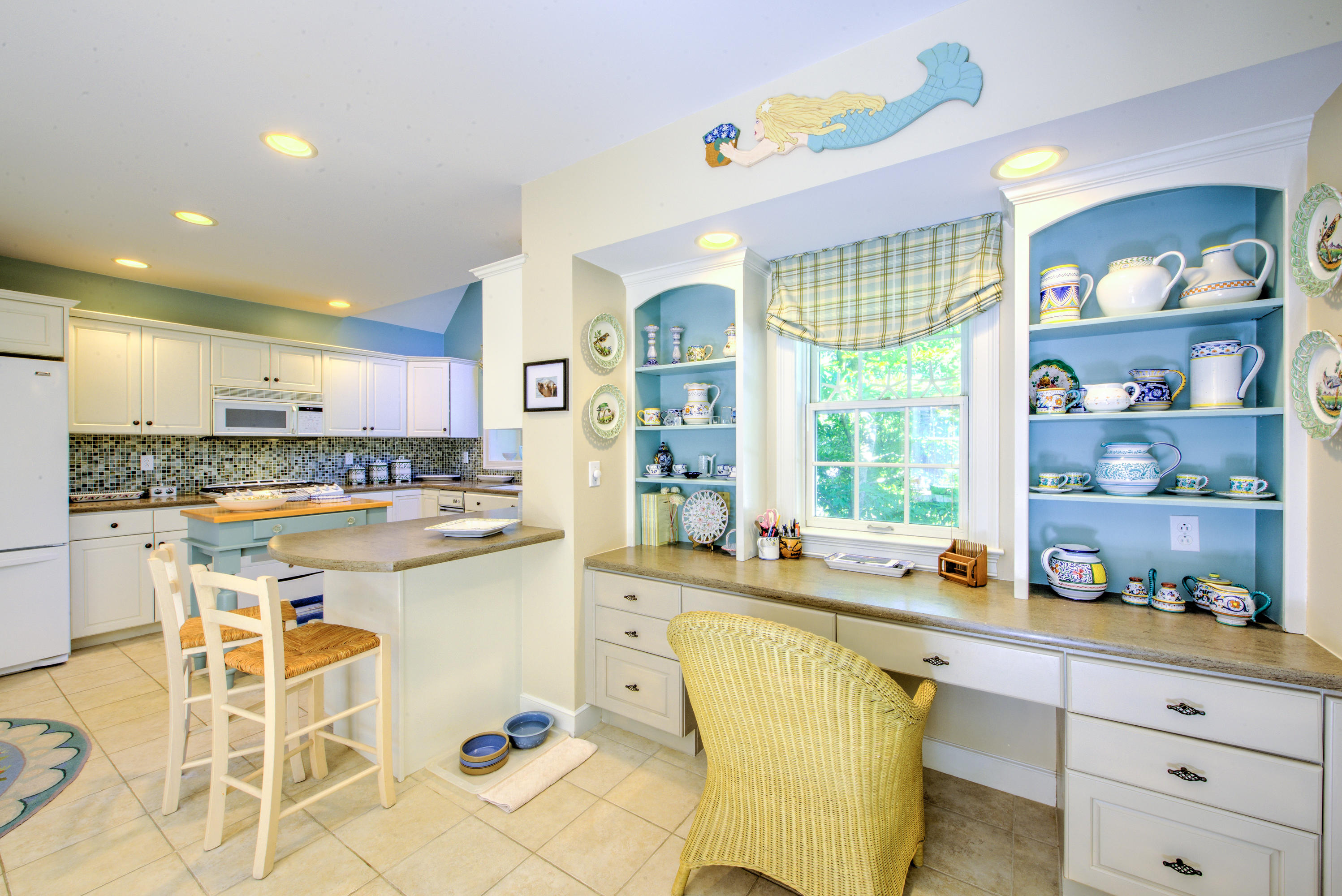 48 Crystal Ridge Road Marstons Mills, MA 02648 - Photo 13 of 26 a kitchen with a sink a stove a refrigerator and cabinets